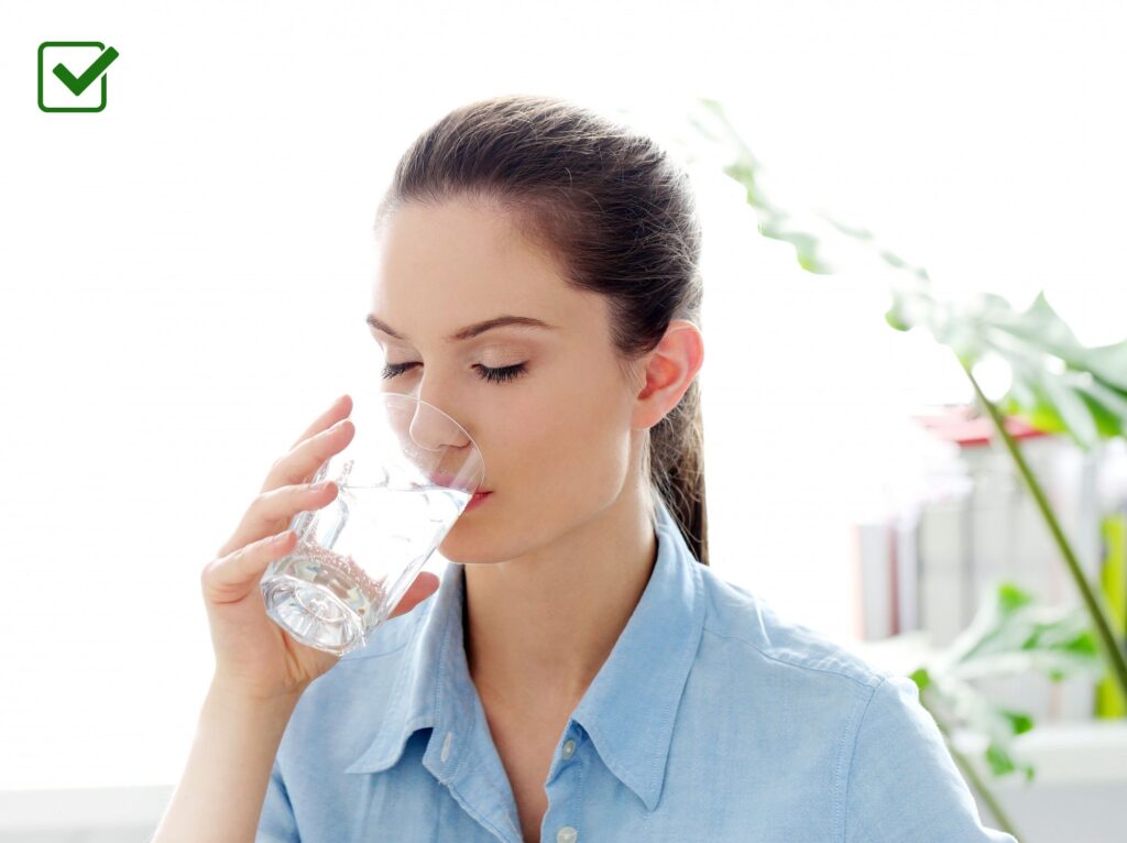 drinking water in glass